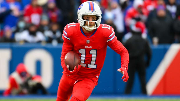 Bills wide receiver Cole Beasley (11) runs with the ball after a catch during the first half of a game against the Panthers.